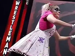 WWE - Alexa Bliss turning a crank at Wrestlemania 37