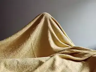 Morning masturbation under the blanket.