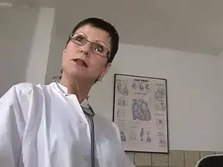 Gyno doctor satisfies herself horny on the gynecologist chair and has a violent orgasm