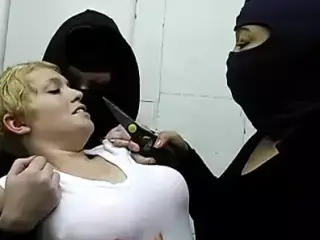 Short-haired kinkster dragged to bondage room by two S and M