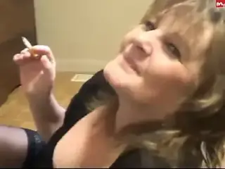 Clothed Milf Smokes and talks dirty