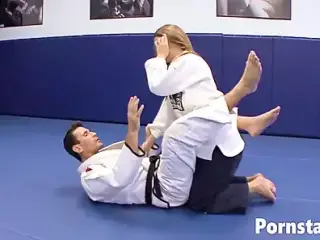 Megan Fenox does karate and with handsome coach