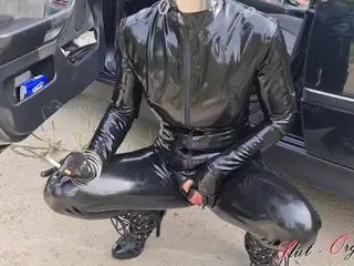 Slut-Orgasma Celeste in black latex public pissing