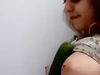 Iranian girl has fun with a cucumber