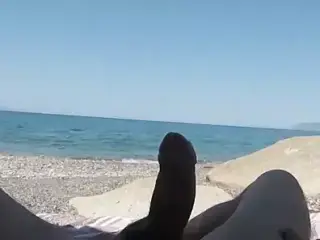 Girl sucks cock at public beach and gets caught by stranger