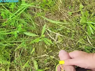 Stepmom holds stepson's cock while he pees in nature