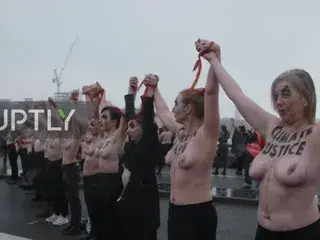 Topless activists block London Bridge