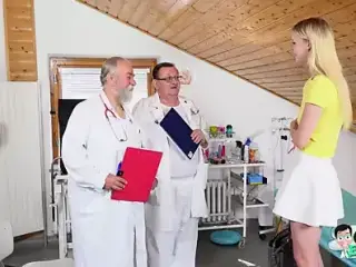 20-year-old sexy blonde girl Ariela Donovan gets her aroused pussy examined by 2 old gynecologists