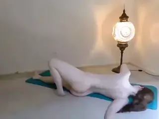 Pale Cutie Does Yoga Next to a Cool Lamp!