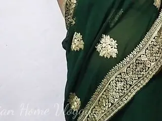 Aunty in a Sexy Saree wearing a bra