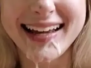 blonde babe sticks her tongue out for cum