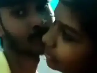 School students kissing parents outside